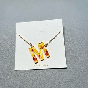 Acrylic “M” pendant necklace
